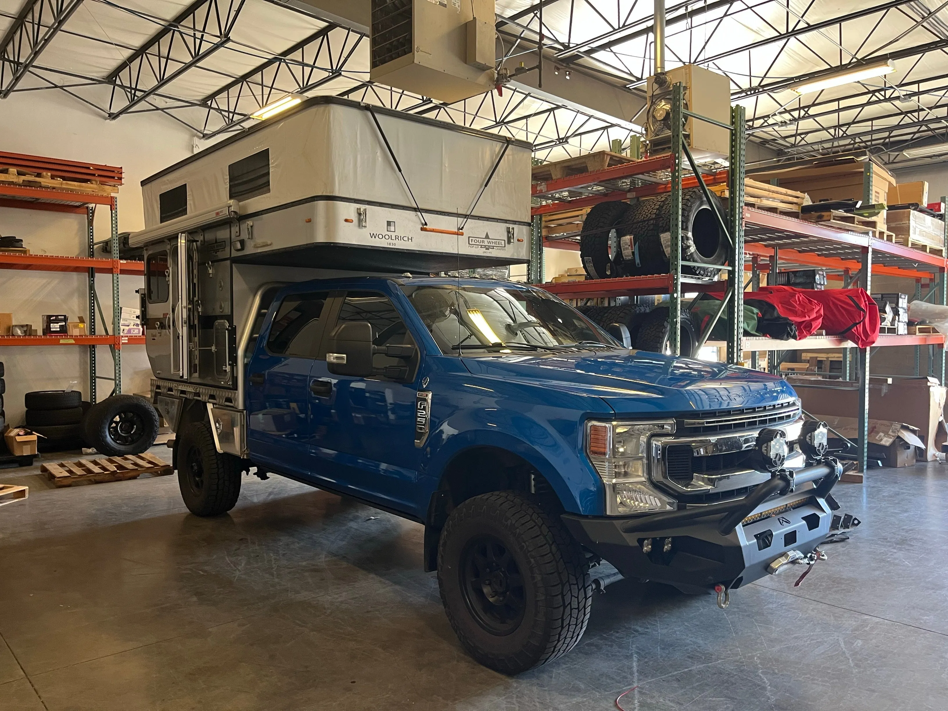 Customer Classified: 2020 Ford F250 and Woolrich Hawk Flatbed Four Wheel Camper Combo