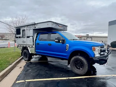 Customer Classified: 2020 Ford F250 and Woolrich Hawk Flatbed Four Wheel Camper Combo