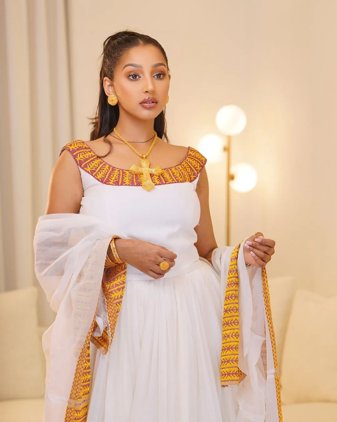 Divine Half Open Back Traditional Ethiopian Dress: with Multicolored Wide Adornments Habesha Dress