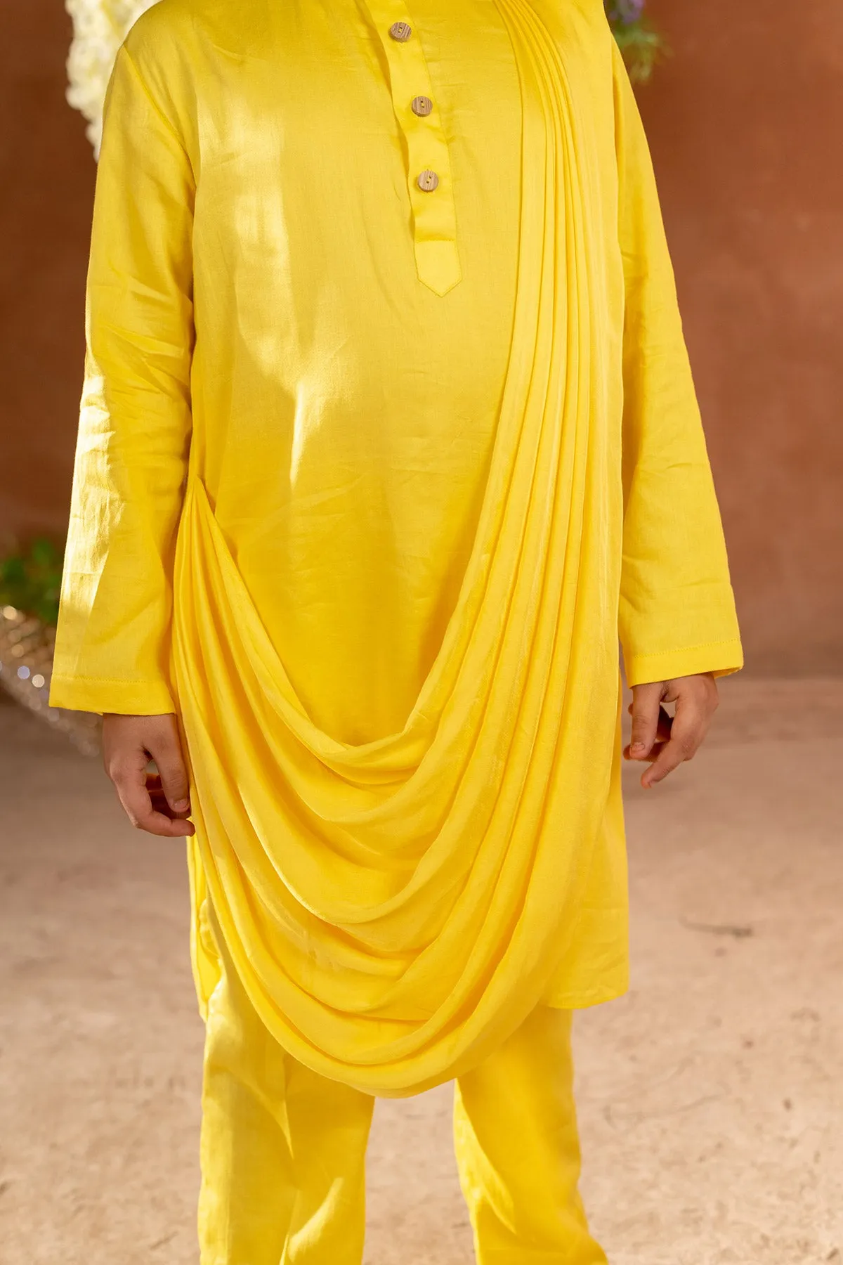 Hvar - 

Drape German  Satin Yellow Kurta Trouser